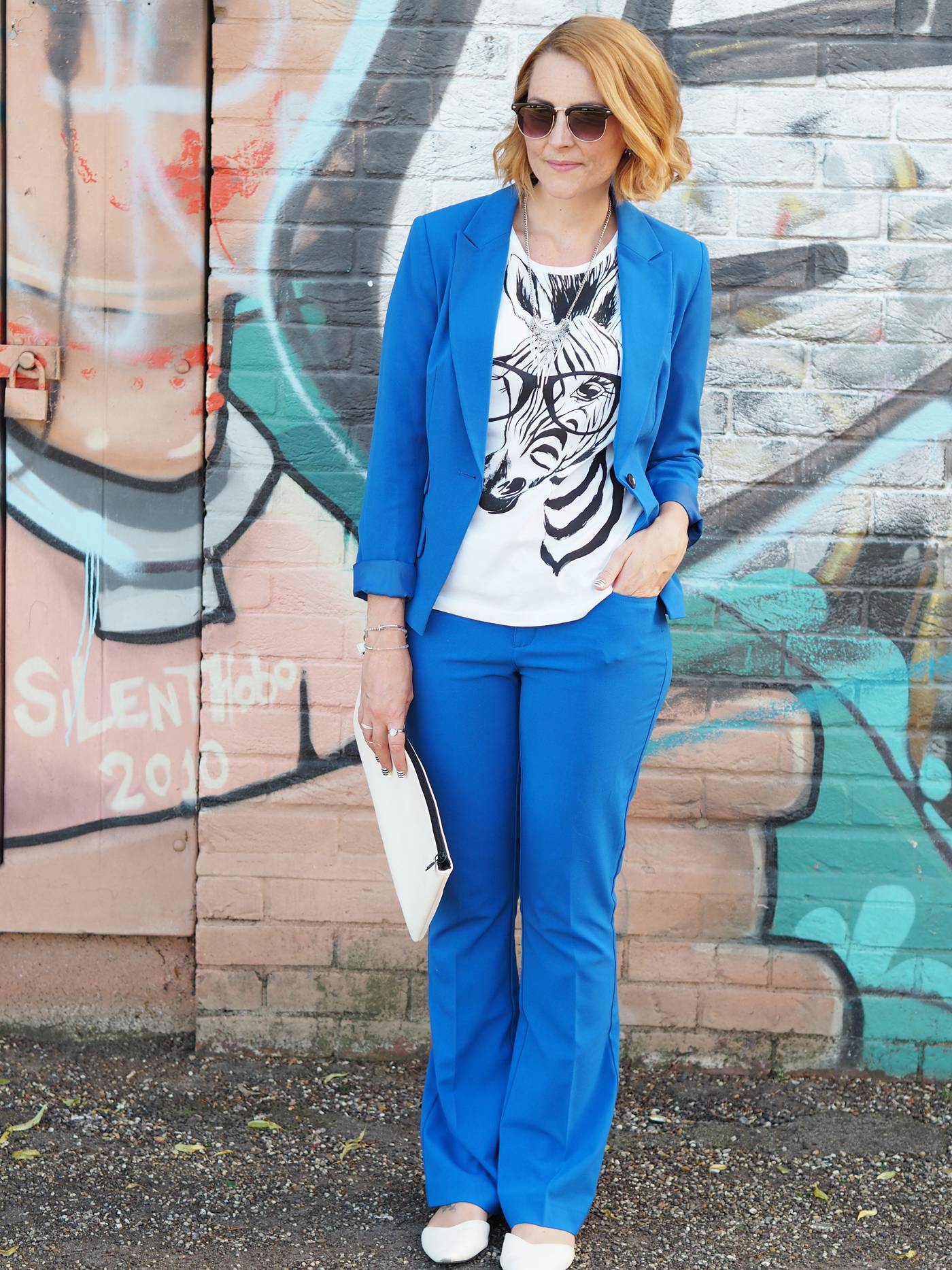 blue trouser suit with graphic tshirt
