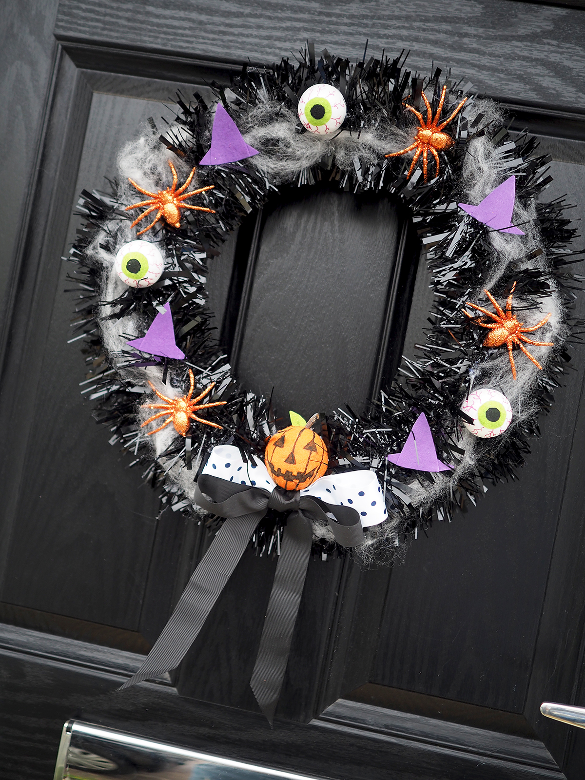 make your own halloween door wreath diy tutorial