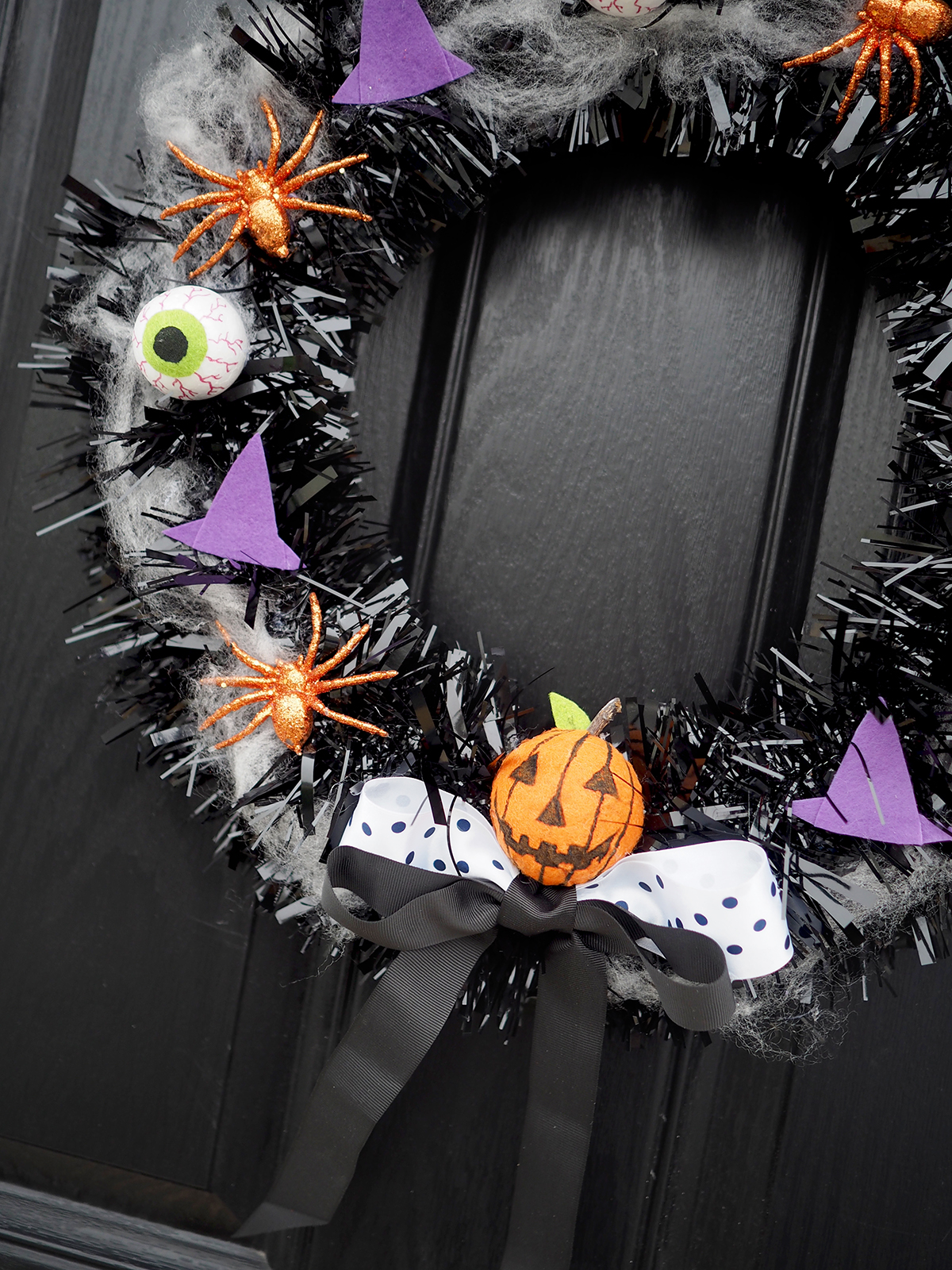 make your own halloween door wreath diy tutorial
